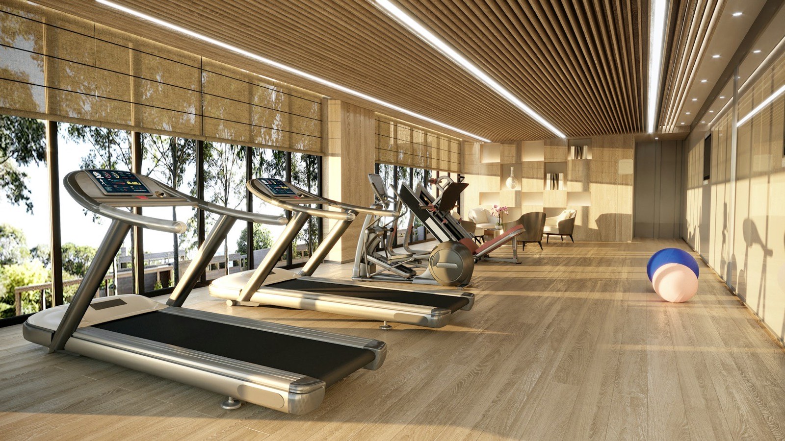 Gimnasio del edificio con ventanales